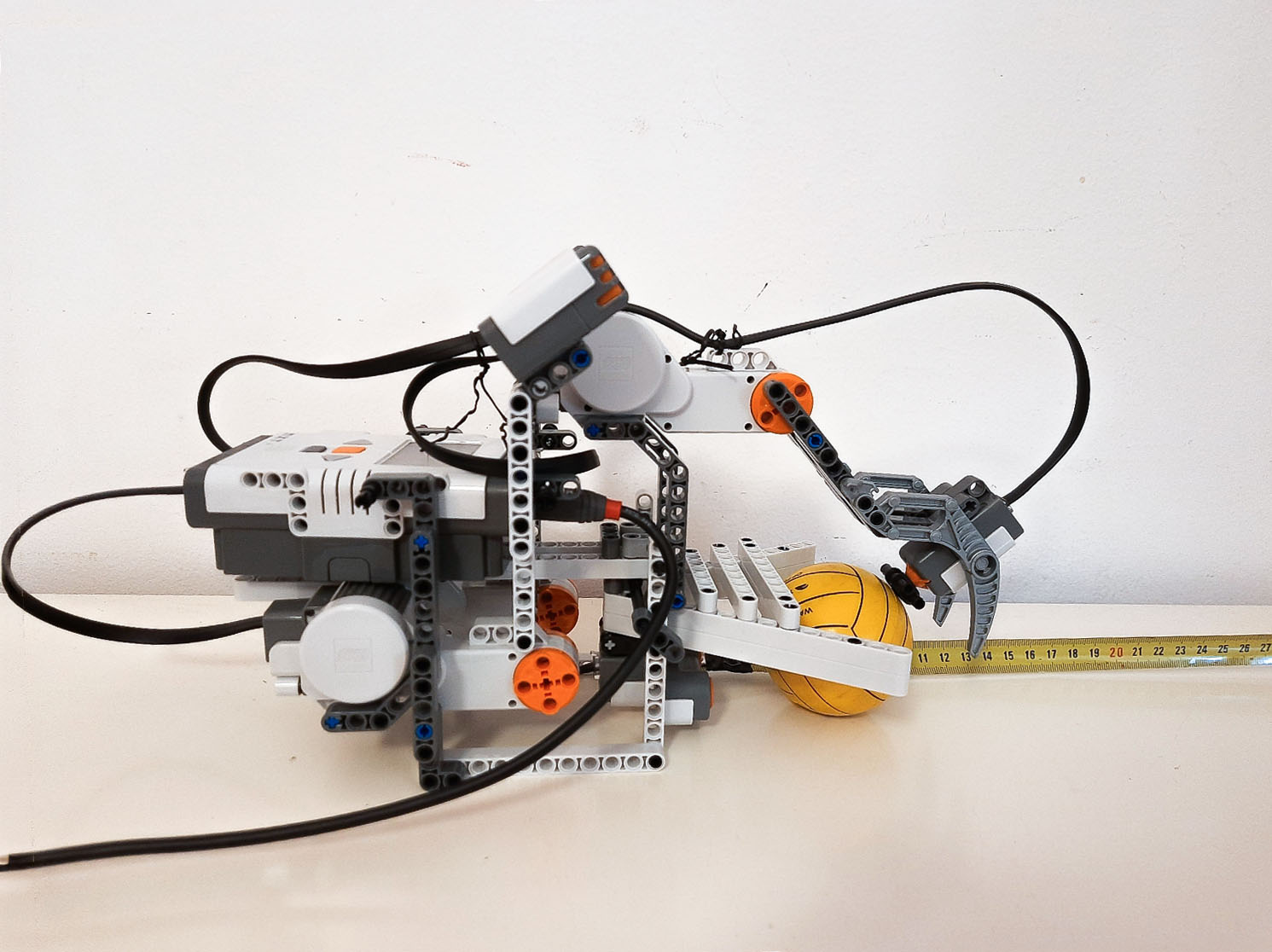 LEGO Mindstorms NXT grasping robot with its gripper closed